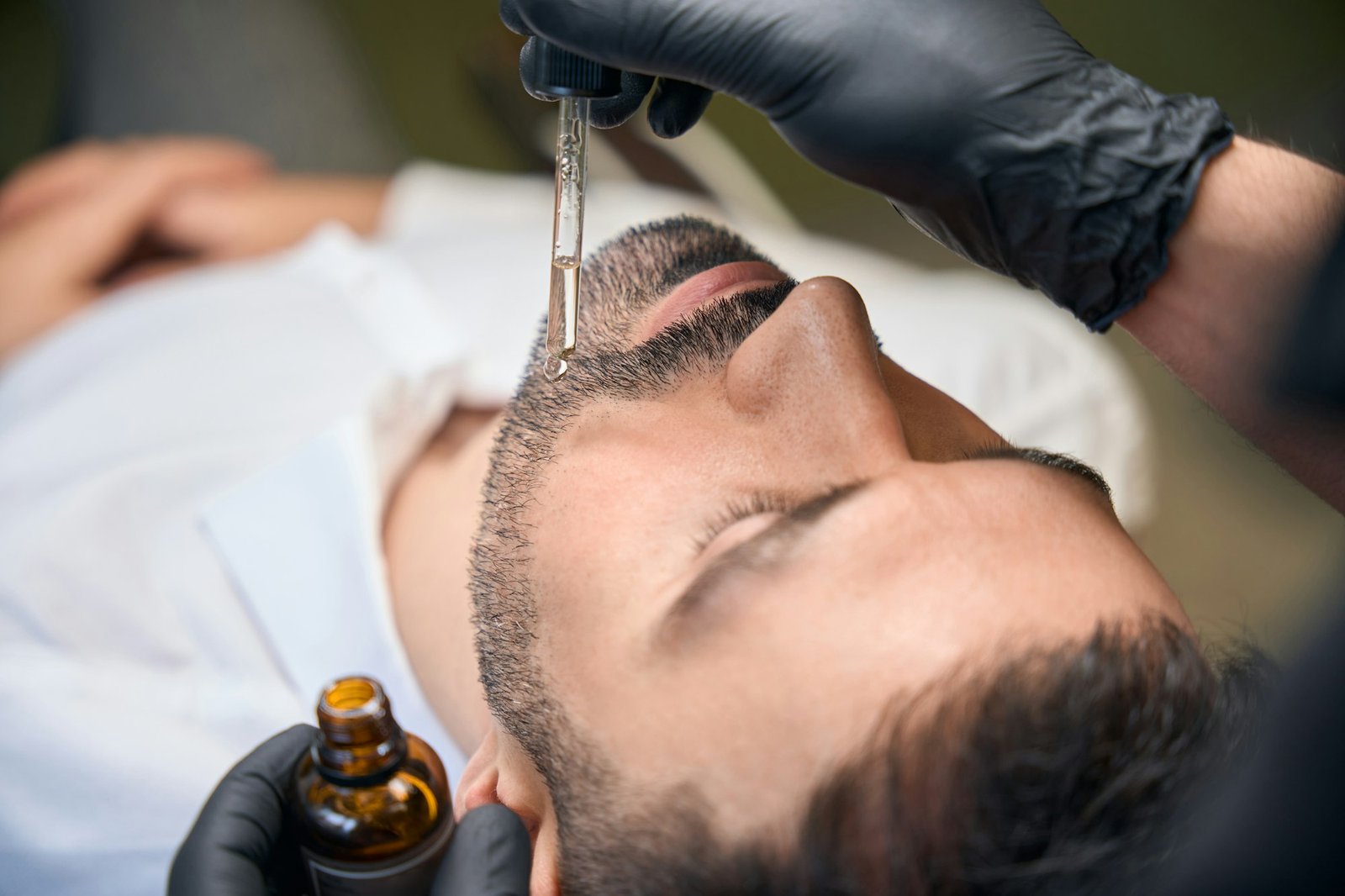 Beard moisturizing with oil for man client