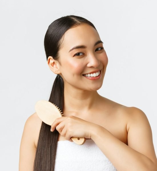 Beauty, hair loss products, shampoo and hair care concept. Close-up of beautiful asian female in