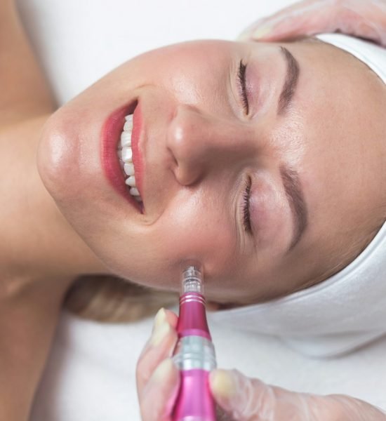 Woman having facial treatment in beauty salon, closeup. Oxy derma therapy