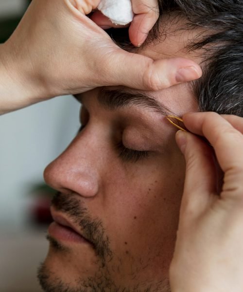 young man plucked his eyebrows